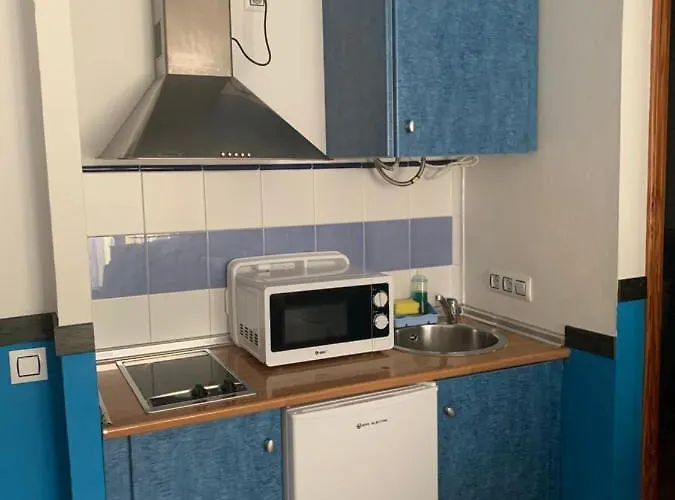 Apartahotel Rompeolas 4* קוניל דה לה פרונטרה